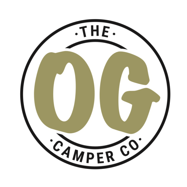 A circular logo with the text "THE OG CAMPER CO." displayed. "OG" is in large, bold, olive-green letters in the center, and "THE" and "CAMPER CO." are in smaller black letters at the top and bottom, respectively. The text is enclosed within a black circle. The background is white.