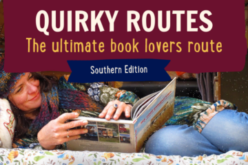 A woman reclines comfortably on a cushion, reading a book. She is dressed in a colorful knit sweater and jeans. A banner above her reads "QUIRKY ROUTES: The ultimate book lovers route, Southern Edition." The cozy setting suggests a relaxed and enjoyable reading experience.