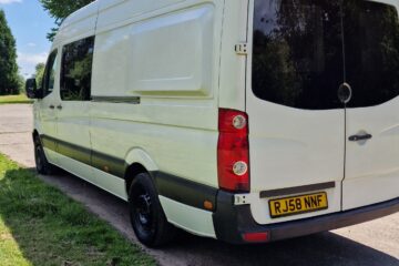 the sides of the van parked on the street