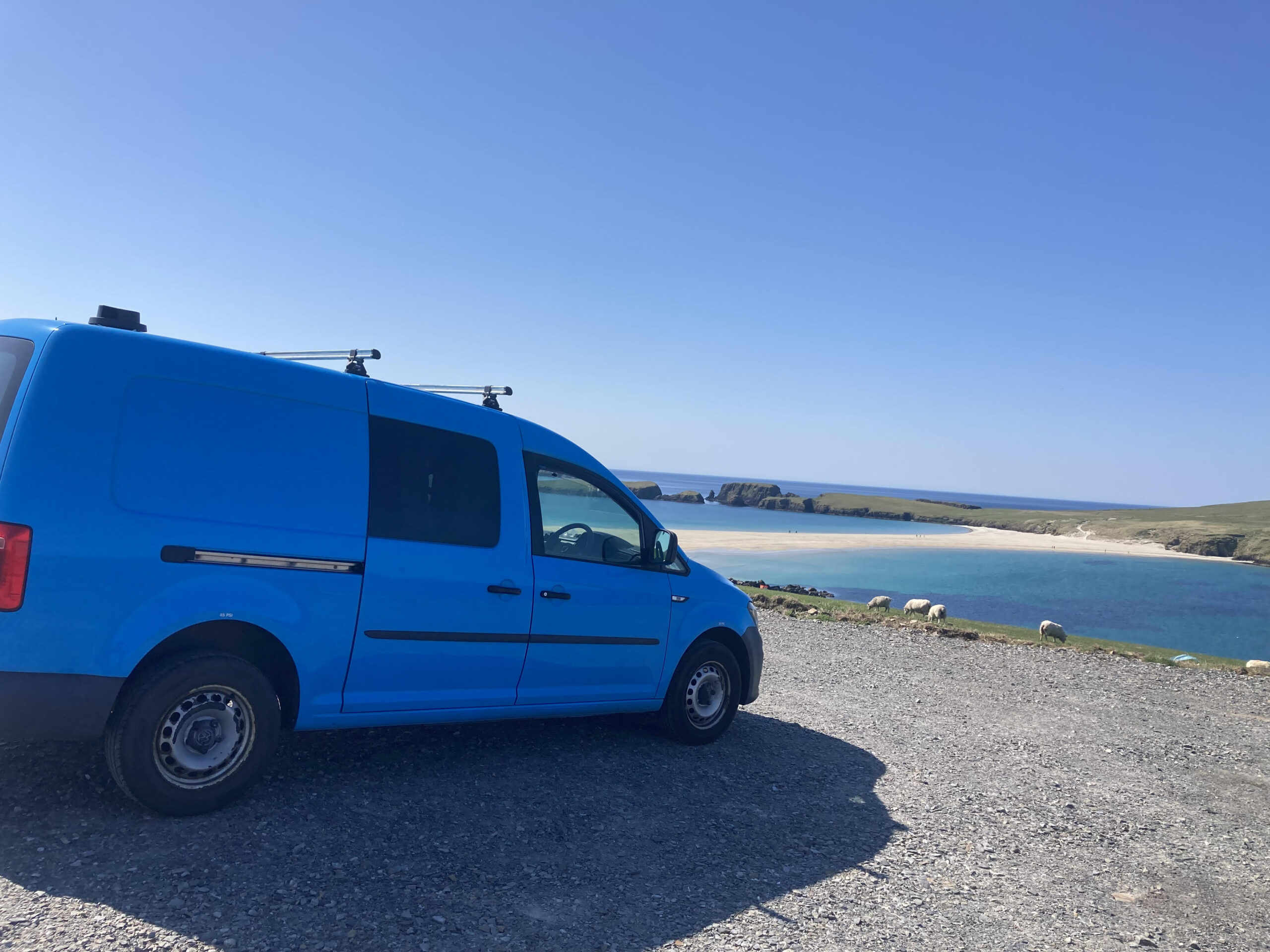 outside of the camper on a coastal background